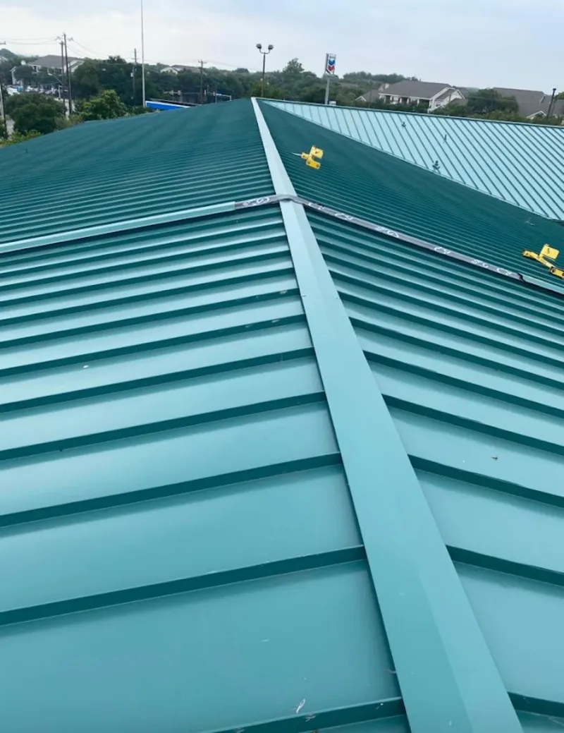 Green commercial metal roof ridge and valley for Metal Roof Repair in Wildomar